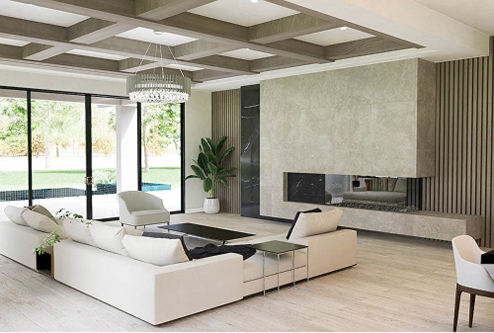 Living room with white sectional couch and neutral color palette